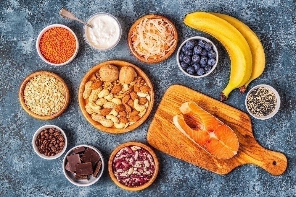 Healthy foods that lift your mood salmon dark chocolate fermented foods sauerkraut yogurt bananas berries nuts oats beans lentils and coffee.