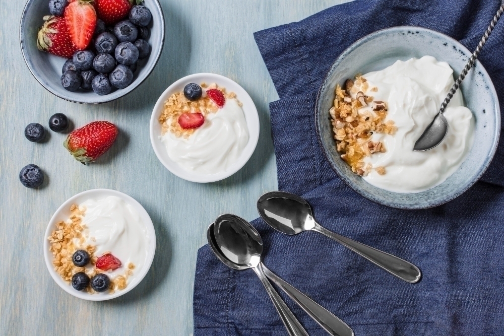Tasty breakfast with yogurt and fruits